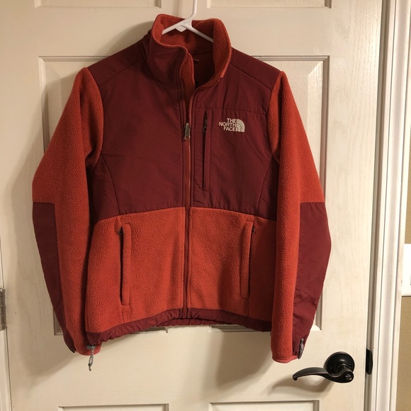 north face burnt orange jacket